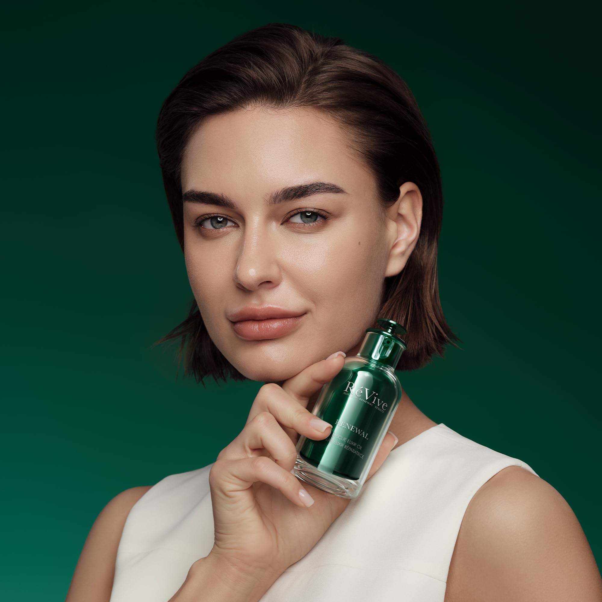 リヴァイブ　ピュアオイル&UVケアクリーム Amazon.com: RéVive Renewal Rescue Elixir Oil, Anti Aging Face Oil